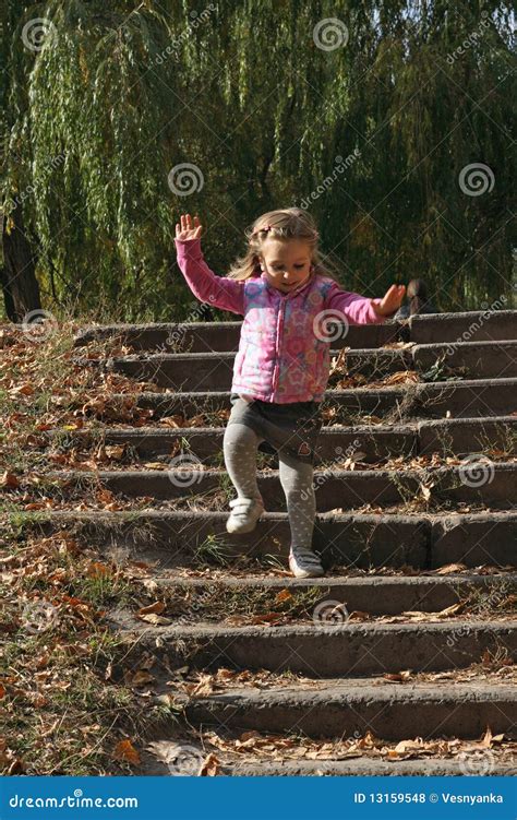 Little Girl Going Down The Steps Stock Photo Image Of Cheerful
