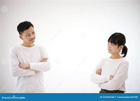 Men And Women Glaring At Each Other Stock Photo Image Of Couple