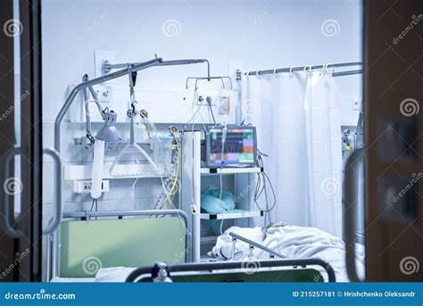 The Patient In The Hospital Room Is Lying On The Bed Stock Image