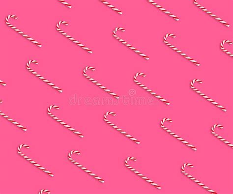 Pattern Of Christmas Candy Canes On Pink Background Top View Stock