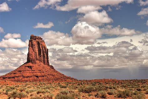 Storm In The Distance Monument Valley Photograph By Bill Mollet