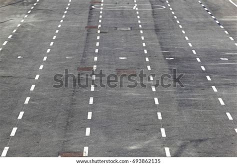 White Racetrack Lines On Pavement Street Stock Photo 693862135