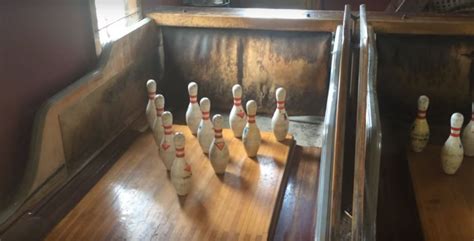 100 year old bowling alley play bowling