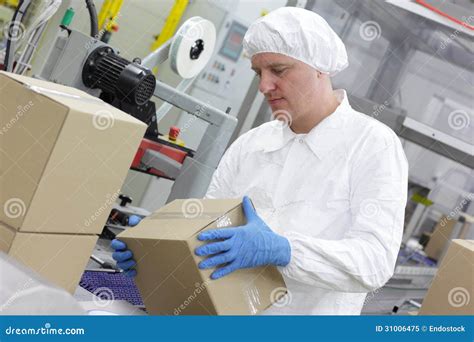 Manual Worker At Production Line Dealing With Boxe Stock Image Image