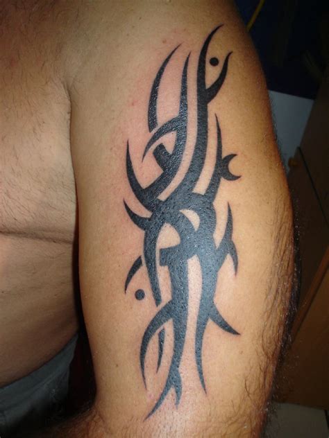 Greatest Tattoos Designs: Tribal Arm Tattoo Designs for Men