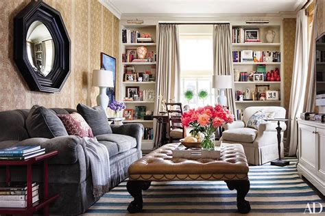 how to incorporate ottomans into your living room decor architectural digest architectural