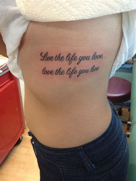 Live The Life You Love Love The Life You Live Tattoo On Ribs Live