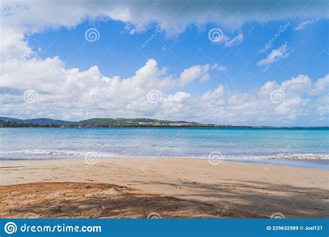Luquillo Beach In Tropical Puerto Rico And White Puffy Clouds Stock