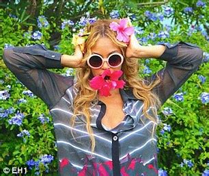 Beyonce Shows Off Her Chest In Plunging Floral Romper As She Poses