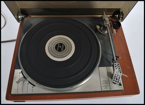 A Vintage 20th Century Lenco Goldring Record Player Deck Set Within A
