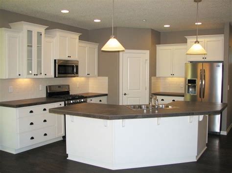 Like the usual one, the angled kitchen island is a continuation of the kitchen's design and other living premises of the house. Camden | Kitchen island remodel ideas, Kitchen island diy ...