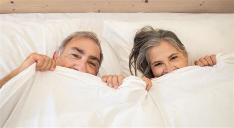 Premium Photo Smiling Old Caucasian Man And Lady Wakes Up In Bed