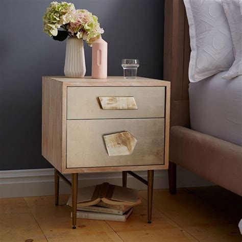 10 Impressive Modern Side Tables That Add Interest To Any Bedroom Set