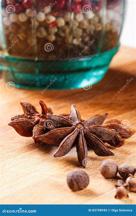Cloves Allspice Star Anise On A Wooden Board Closeup Stock Image