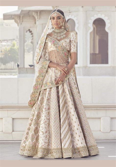 Off White Color Wedding Lehenga Choli Sabyasachi Lehenga Bridal Indian Bridal Outfits Indian