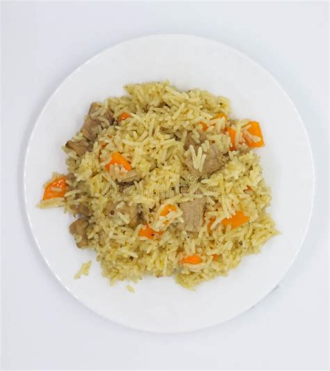 Pilaf Traditional Dish Of Eastern Europe On A White Plate Stock Photo