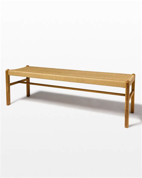 Pair of woven rattan x benches. AB057 Chester Woven Rattan Bench Prop Rental | ACME Brooklyn