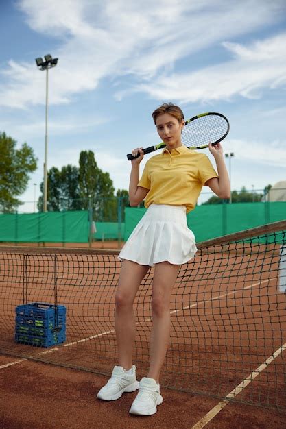Premium Photo Young Woman Tennis Player In Trendy Fashion Sportswear