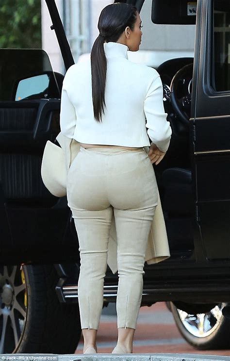kim kardashian steps out in very tight fitting cream trousers daily mail online