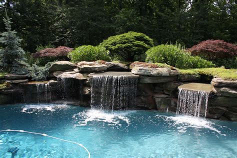 Modern Pool Landscaping Ideas With Rocks And Plants