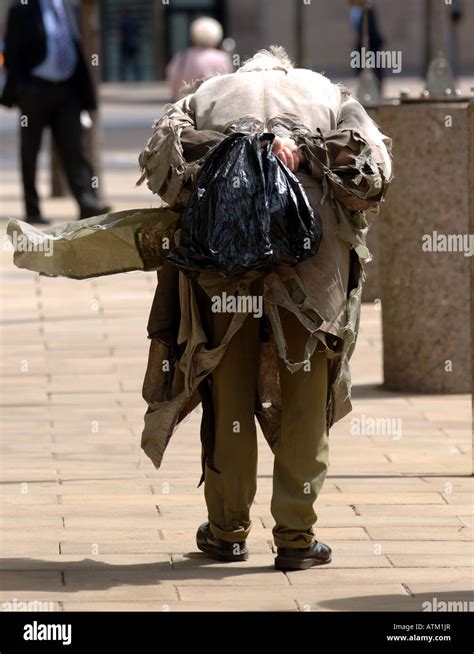 Tramp Homeless Man Walking The Streets In Edinburgh Scotland Stock Photo Royalty Free Image