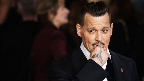 Johnny Depp Is Coping With Yet Another Unfortunate Breakup