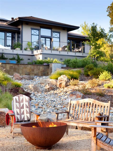 Pass back and forth between you and. Fire Pit On A Slope | Houzz