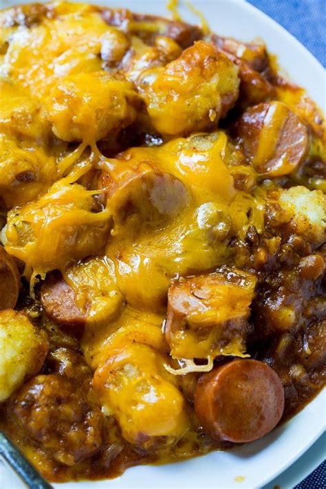 In a large bowl, combine sliced hot dogs, chili, ketchup, worcestershire sauce, onion, and red pepper flakes. Cheesy Hot Dog Tater Tot Casserole | Recipe | Easy ...