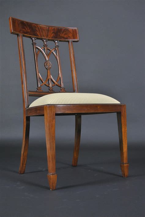 Inspired by great furniture designers such as george hepplewhite in the 18th century this long dining table is both simple and elegant. Hepplewhite style dining chairs with swirl mahogany crest