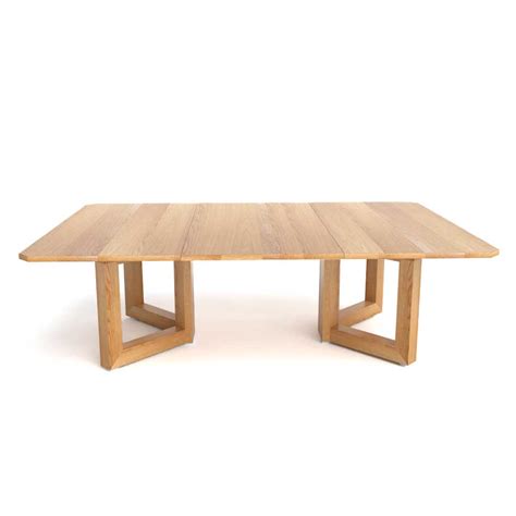 Looking for a dining table for small space? Square extending oak table with central column - Dovetailors