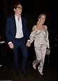 Ellie Goulding looks chic in a pink co-ord ensemble with husband Caspar ...