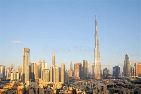 Dubai City Skyline With Burj Khalifa Skyscraper In A Sunny Day Blue