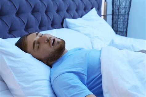 Young Man Snoring While Sleeping In Bed At Night Sleep Disorder Sleep Dynamics