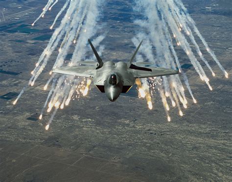 Your wallpaper flare stock images are ready. Gray aircraft, F22-Raptor, flares, military aircraft HD ...