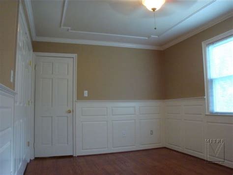 I love the look of traditional wainscoting for the walls, but like tongue and groove/shiplap for the ceilings. Wainscoting with Raised Panels - MITRE CONTRACTING, INC.