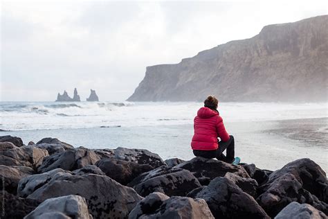 Lonely Woman Watching The Sea By Stocksy Contributor Lucas Ottone