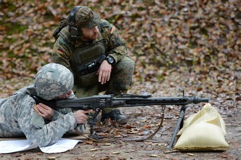 A Us Soldier Fires A Rheinmetall Mg3 Machine Gun During The