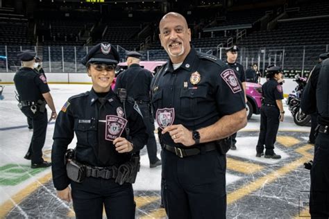 Massachusetts State Police Volunteers Take Part In Annual Pink Patch