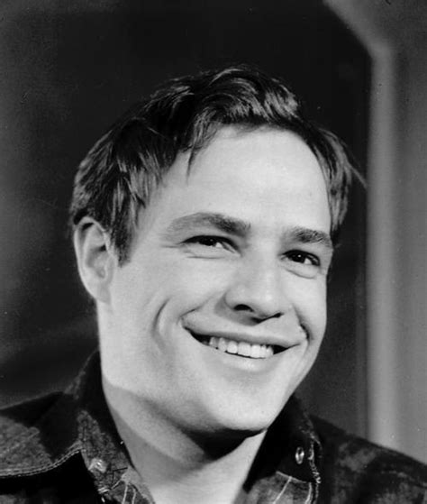 His body is later put on display in a public square. Beautiful Black & White Portraits of young Marlon Brando ...