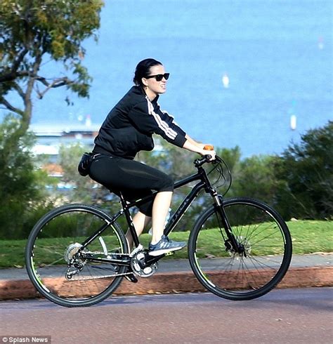 Katy Perry Out For Bike Ride Around Perth But Doesnt Wear A Helmet