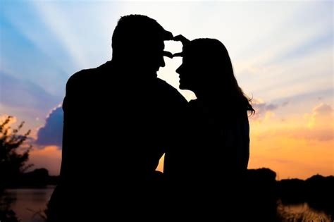 Premium Photo Happy Couple Silhouette On The Sunset Background Nature