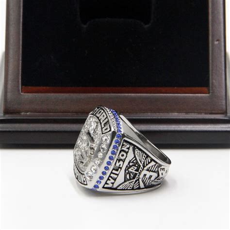 As the tweet describes, the rings contain 12 gemstones, 12 feathers and 12 flags to honor the fans, whom they call the 12th man. NFL 2013 Super Bowl XLVIII Seattle Seahawks Championship ...
