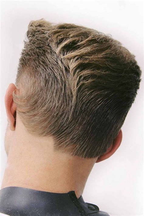 A ducktail haircut is a cut where the back bottom part of the hair is left to grow in form of a tail while the rest of the head is made bald. Ducktail Haircut For Men: 12 Modern And Retro Styles ...