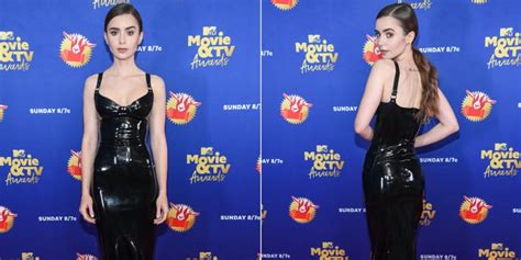Lily Collins Steps Out Of Character In A Sultry Black Latex Dress At