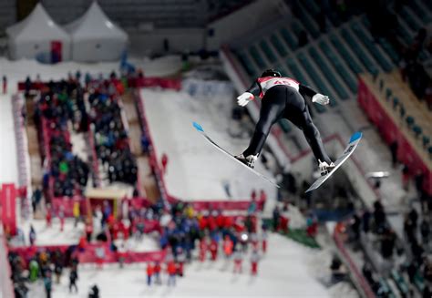 Men's Olympic normal hill individual ski jumping event