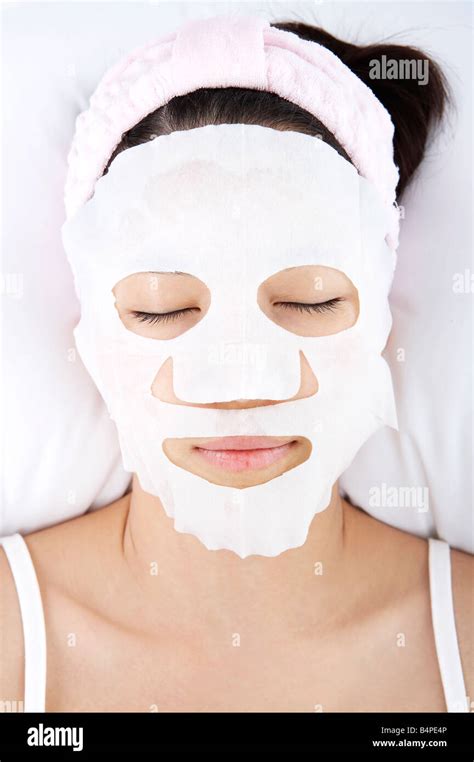Young Woman Receiving Facial In Spa Close Up Stock Photo Alamy