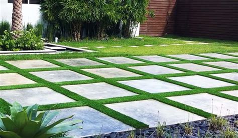 Soften the look of pavers with mondo grass grouting. Artificial Grass Between Pavers - Everything You Need to Know