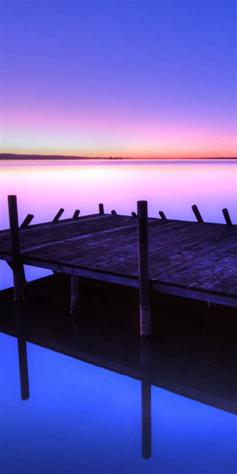 Download 1080x2160 Wallpaper Lake Wooden Dock Blue Sunset Honor 7x