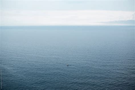 Small Boat Sailing The Sea By Stocksy Contributor Blue Collectors
