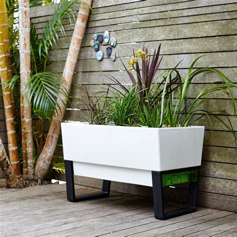 We pride ourselves on the quality of our work and build each wooden garden planter. Modern Balcony Planters: The Space Savvy Solution for ...